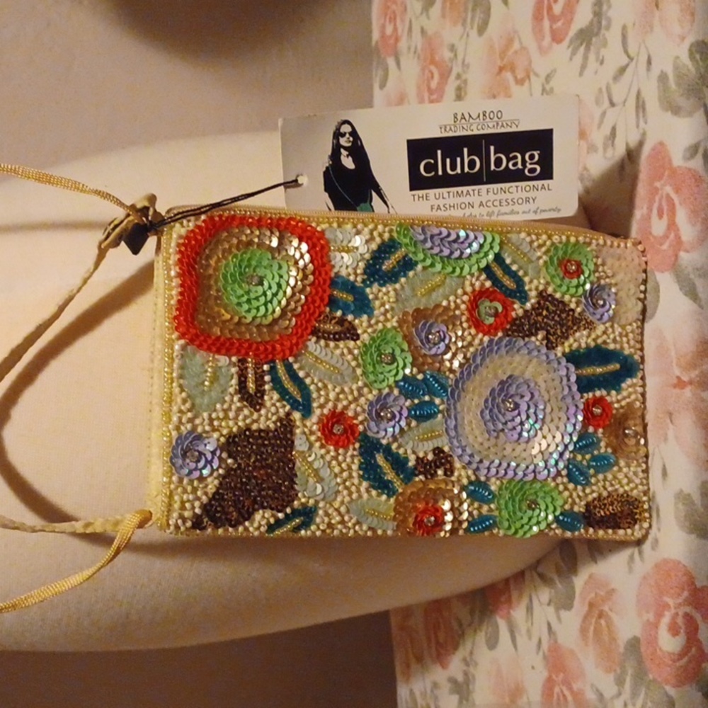 BAMBOO TRADING CO. Fashion Accessory, crossbody or small snap strap .